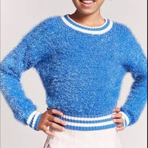 ISO Forever 21 Girls Knit Fuzzy Sweater in a 11/12 or 13/14.  Please contact me.